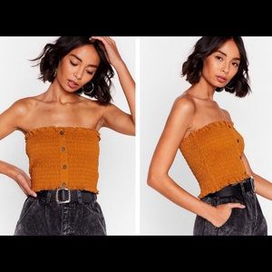 Forget what you shirred bandeau. Size medium. Mustard brown color
